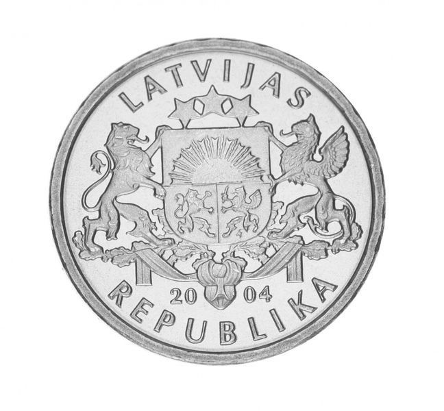 Монета Латвія 1 лат 2004 UNC Вступ Латвії в ЄС Хлопчик (спрідітіс) М16631 фото